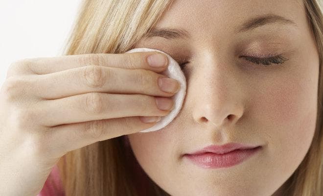 Girl Wiping Eye