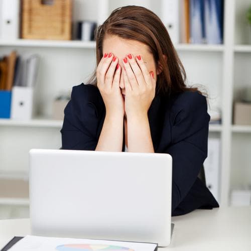 Tired or depressed businesswoman